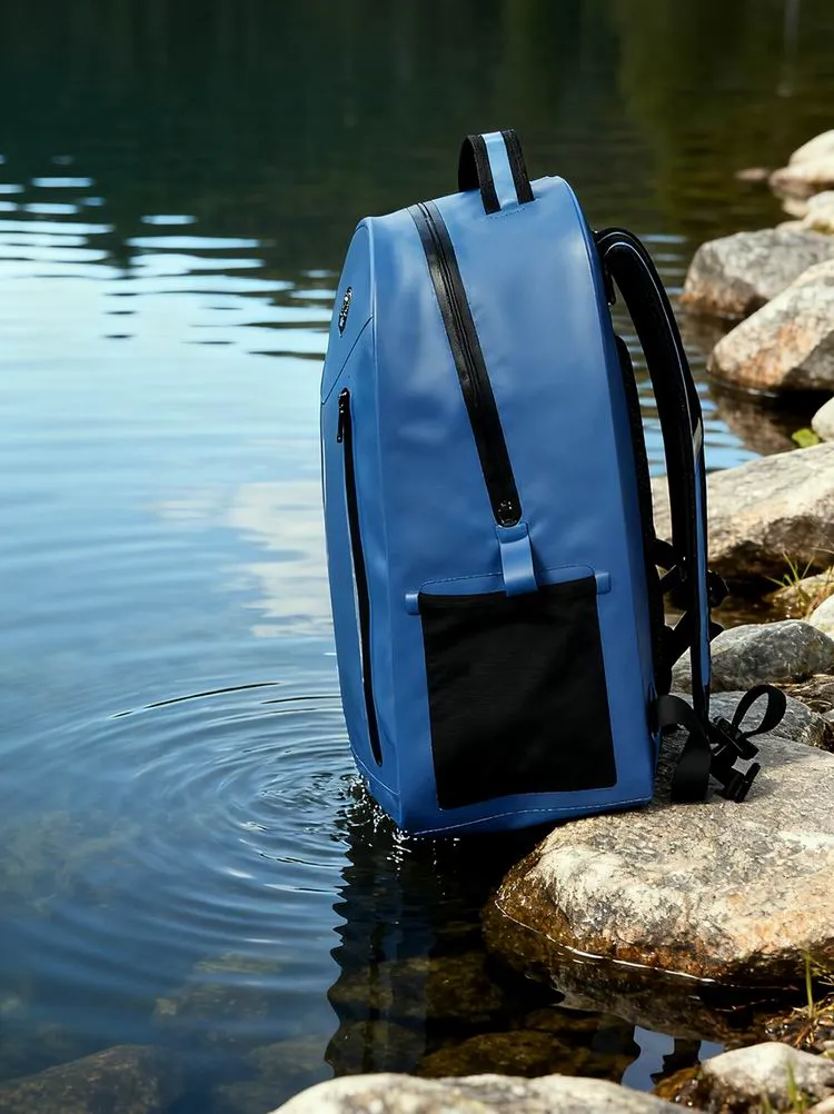 Waterproof backpack loaded and strapped for a field trial